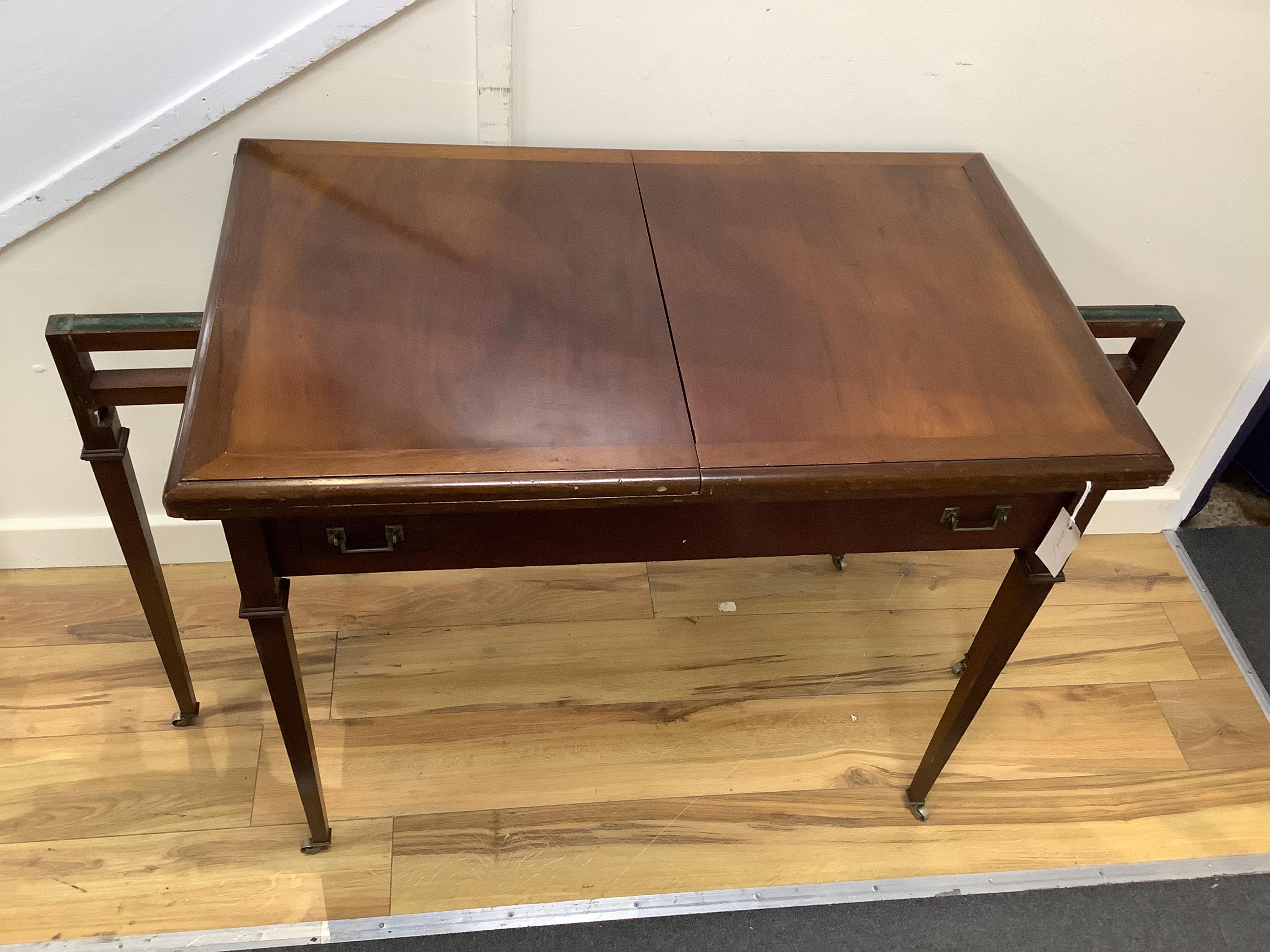 A rectangular mahogany roulette table with twin flap top, width 92cm, depth 57cm, height 77cm